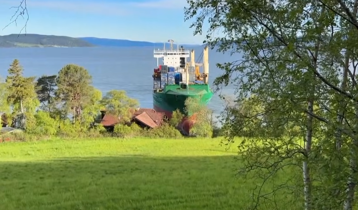 Massive container ship stranded in a residential garden in Norway