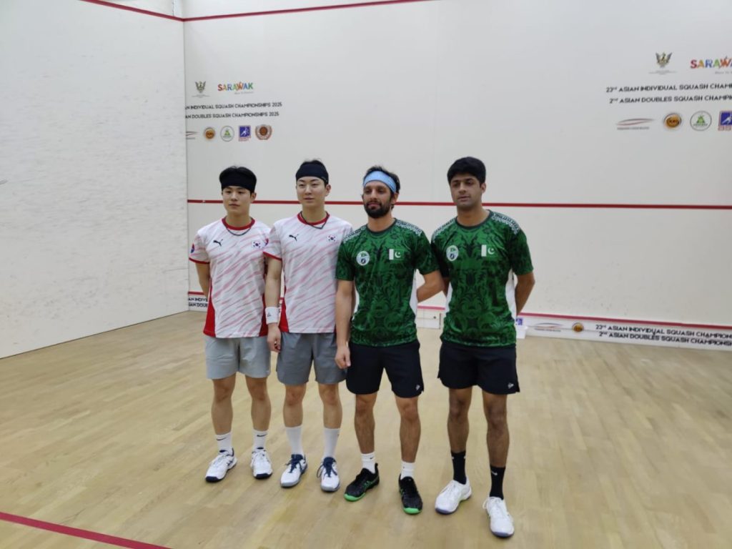 Nasir Iqbal and Noor Zaman celebrate win over Malaysia in squash semi-final.